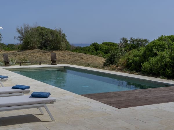 Choose your spot for a day at Villa Ampeli's enticing pool.