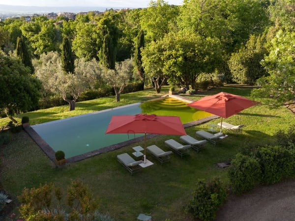 Choose your spot for a tranquil day by the pool.
