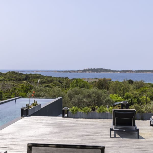 A wide expanse of decking offers plenty of poolside space.