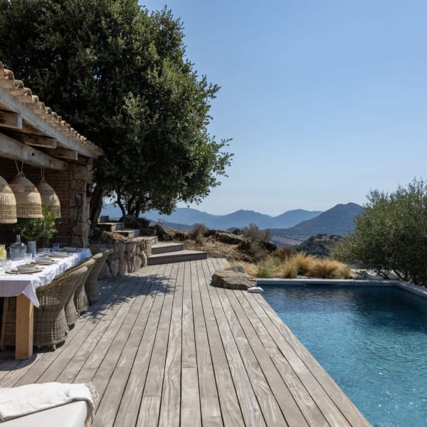 The gorgeous pool area, where you can swim, soak up the sun, cook and dine.