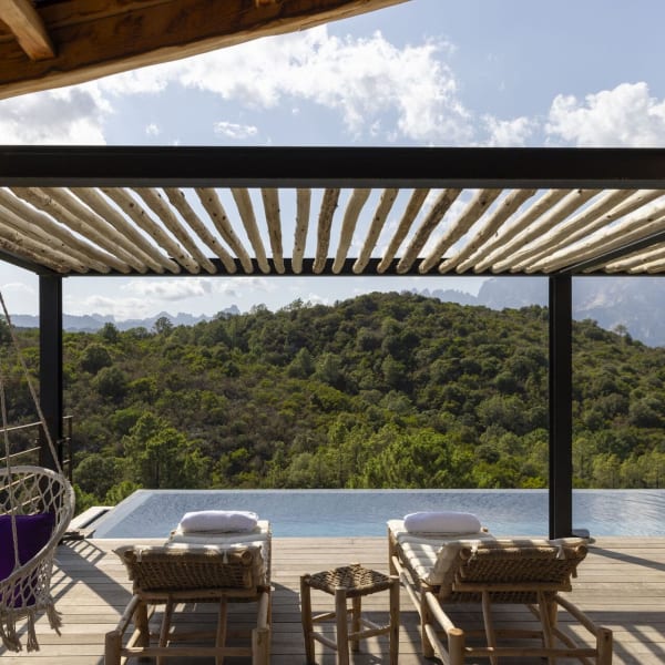 The pool terrace outside the communal space with its sublime views.