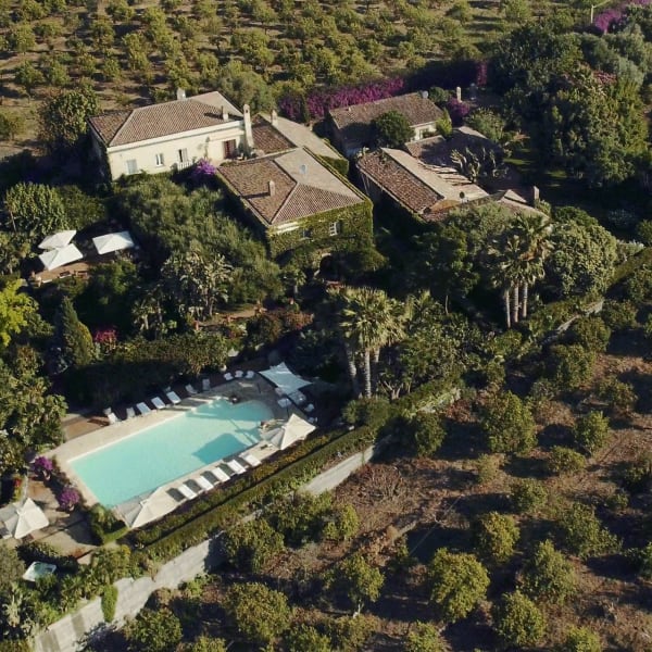 The house, pool and views seen from above.