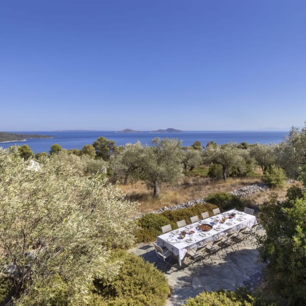 Spellbinding views out across Adelphia's extensive grounds to the sea.