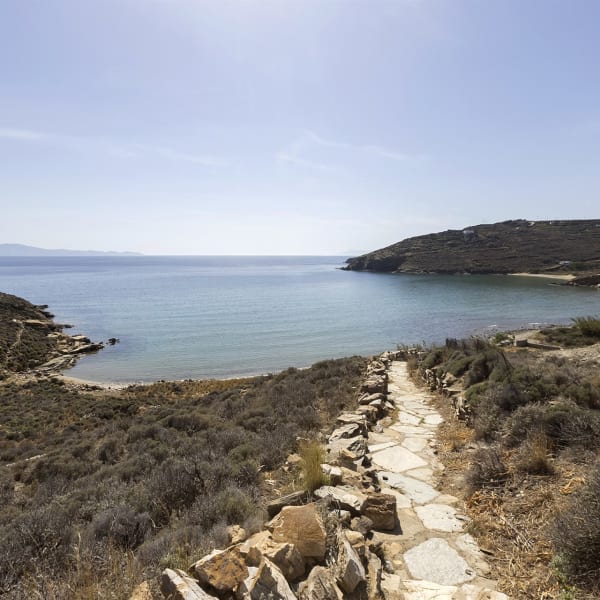 A path weaves down from Agnes to the Agios Petros beach.