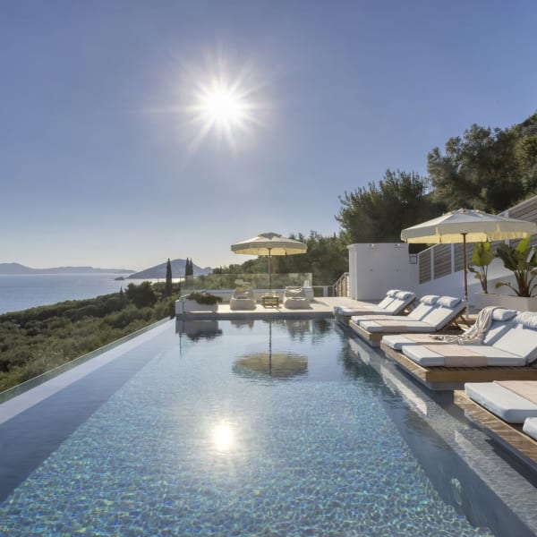 Amiddalia's beautiful infinity pool with its magical views over Keri Bay.
