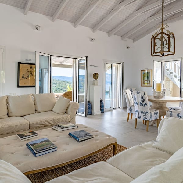 The luminous living and dining area on the upper level of the house.