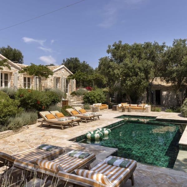 The shady gardens, terraces and pool.