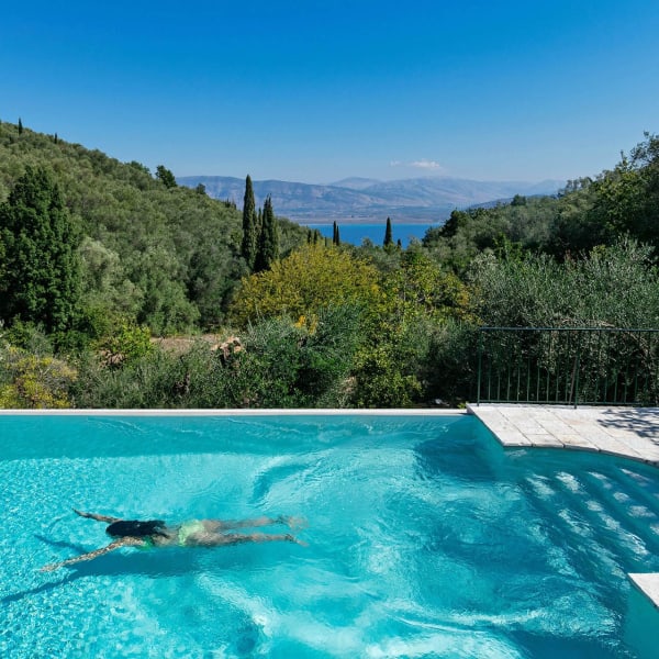 Glorious views out over the pool, the green hills and the Channel of Corfu.
