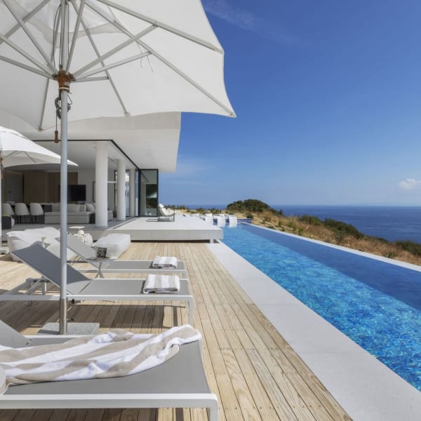 Choose your spot by the main pool for some well-deserved relaxation.