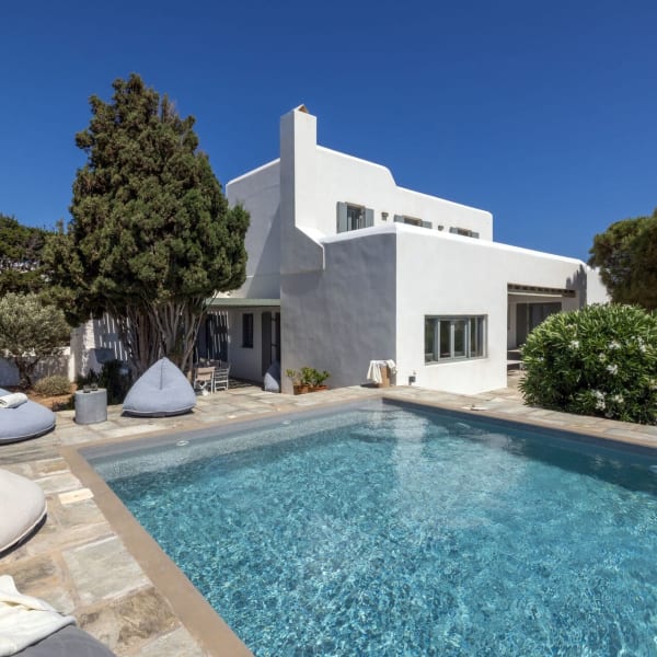 Gabbie's pure white façade seen from the pool.