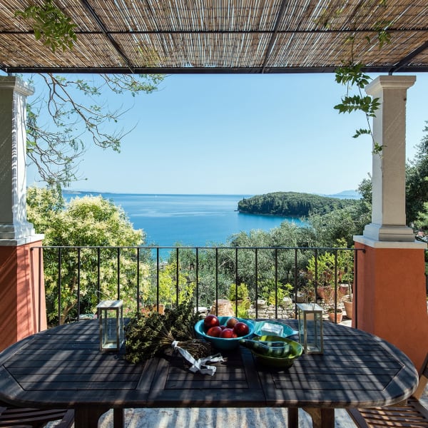 The main dining terrace overlooks the pool and the sea.