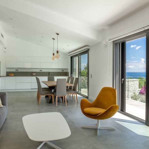 The luminous open-plan living and dining area.
