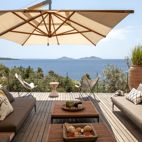 The beautifully furnished terrace outside the main house's living and dining area. 