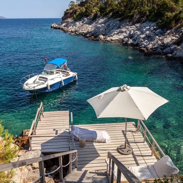 The private jetty and sea access below Kolokithi Bay.