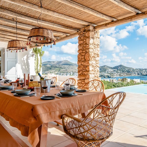 The secluded, panoramic al fresco dining area between the main house and the guesthouse.