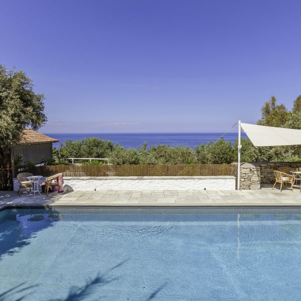 The pool is surrounded by sunloungers to enjoy both sun and shade.