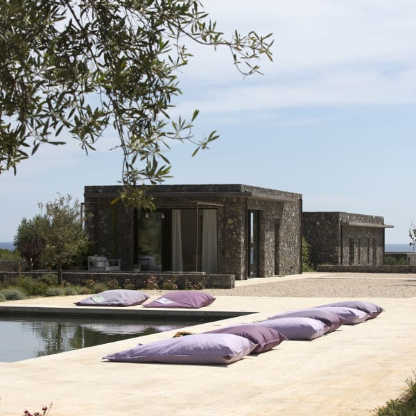 The guesthouse at Olika, situated between the serene pool and the main house.