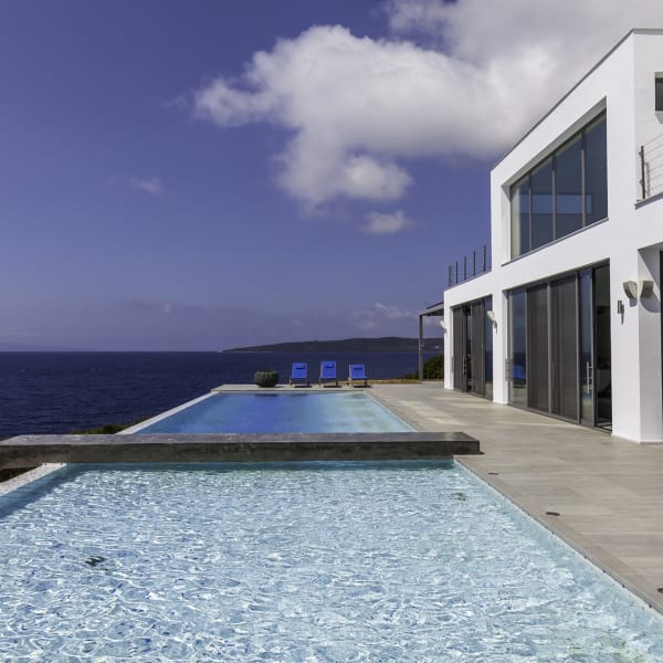 The contemporary design of Penio with its walls of glass sliding doors.