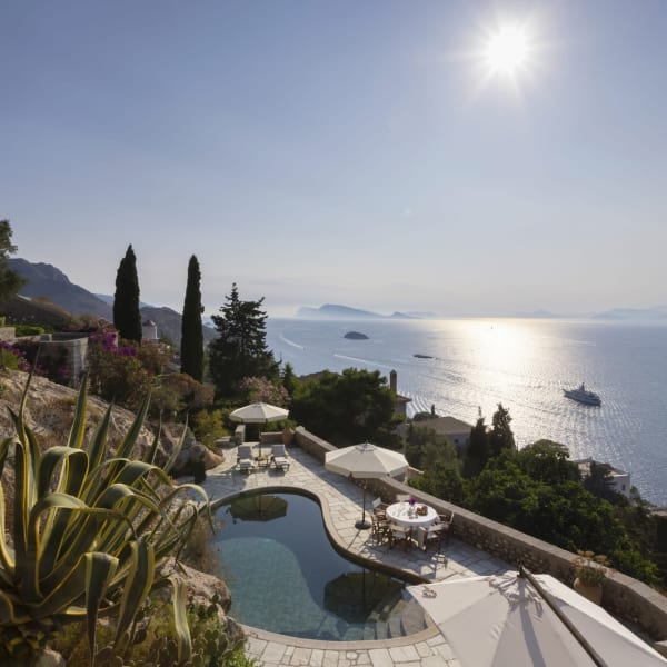 Views over the terraced gardens, the pool and the sea from the main house.