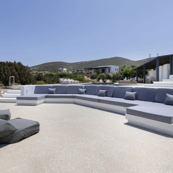 The convivial, comfortably cushioned lounge area below the pool.