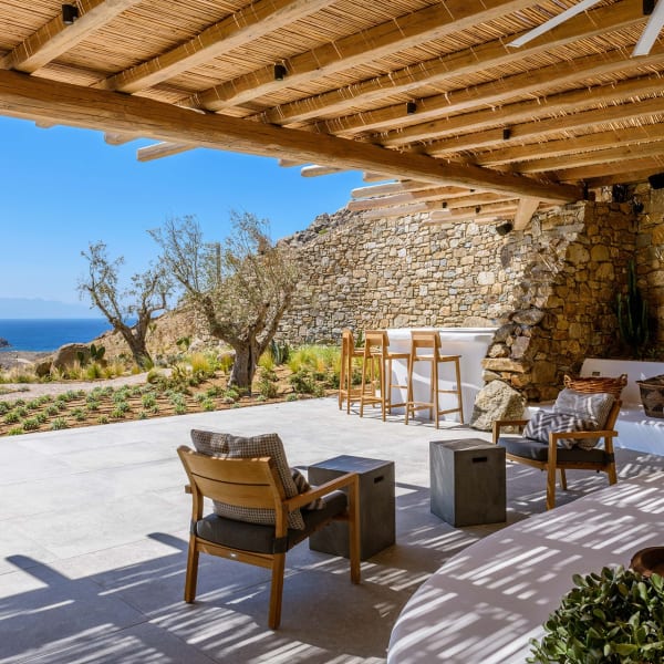 The shaded al fresco lounge area outside the open-plan living and dining area.