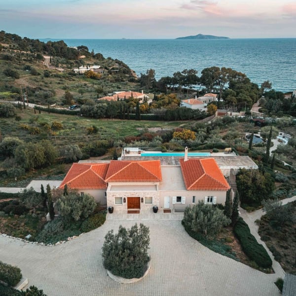 Villa Donna Maria rises in a panoramic position above the Aegean Sea.