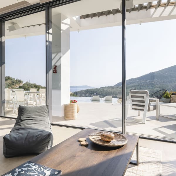 Villa Ella's luminous living area looking out at the views.