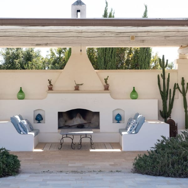 A fireplace takes the chill of al fresco evenings in the shoulder seasons. 