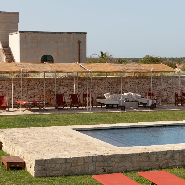 The pool area has plenty of shady and sun-kissed spots to choose from.
