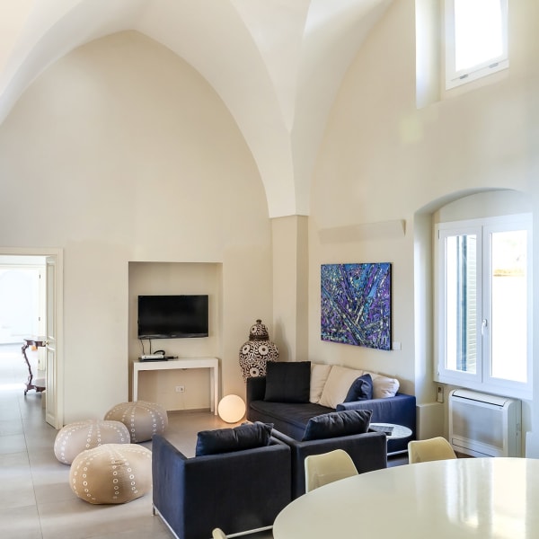 The open-plan living and dining area from the kitchen end.