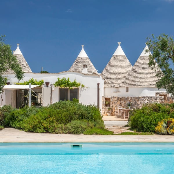 The pool and gardens with Trullo Gaura behind.