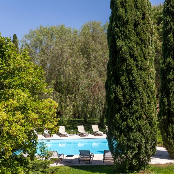The pool and the extensive, manicured gardens are a delight to behold.