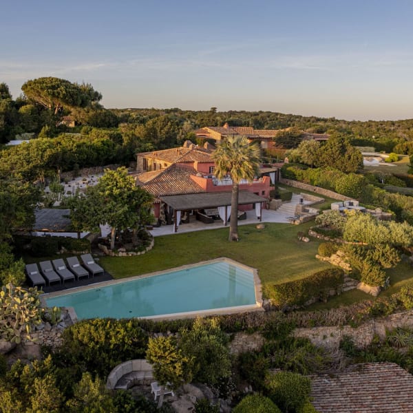 I Corbezzoli rising amidst its flourishing, luxuriant gardens.