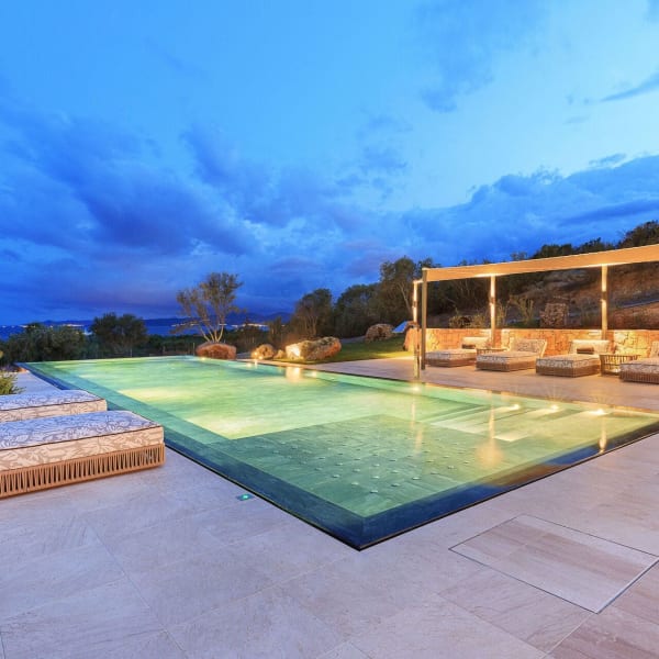A magical atmosphere by the pool as dusk falls.