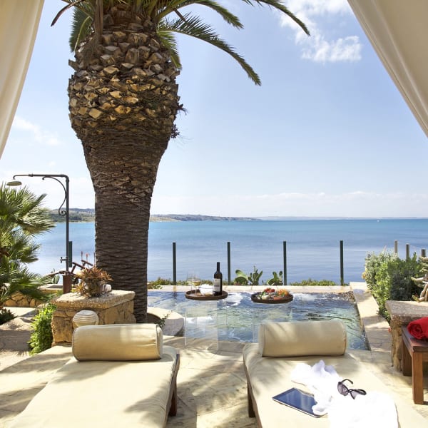 Azzurra's furnished sea-view terrace and plunge pool.