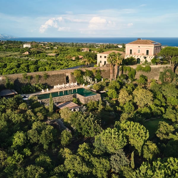 Rocca delle Tre Contrade rising handsomely on its hill above the Ionian Sea.