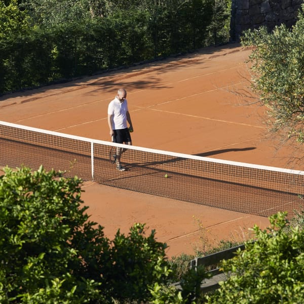 The clay court at Rocca delle Tre Contrade is perfect for tennis lovers.