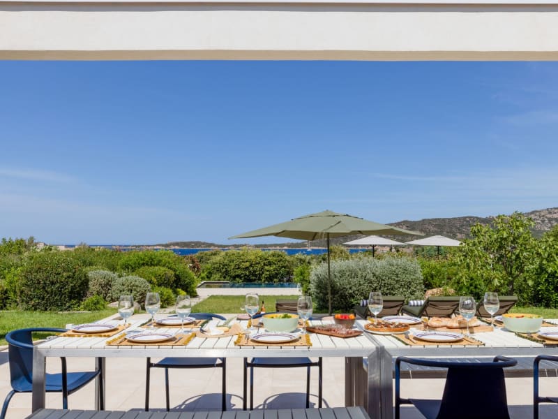 The al fresco dining area on the sea-facing terrace, just outside the living area.