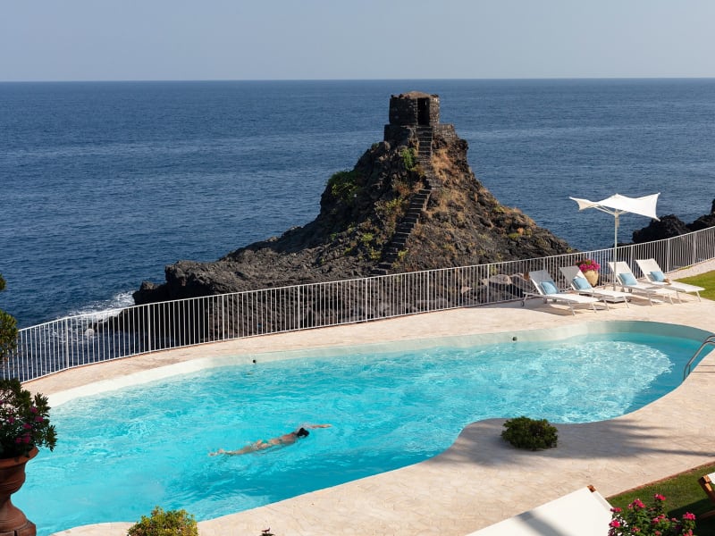 Taking a dip in to the refreshing waters of the pool.