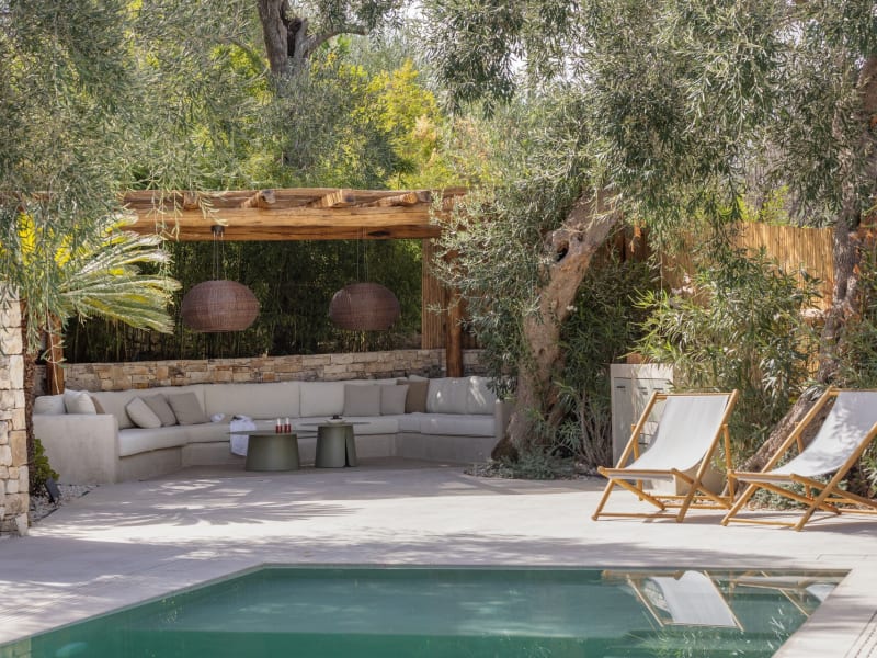 The shaded sitting area near the pool.