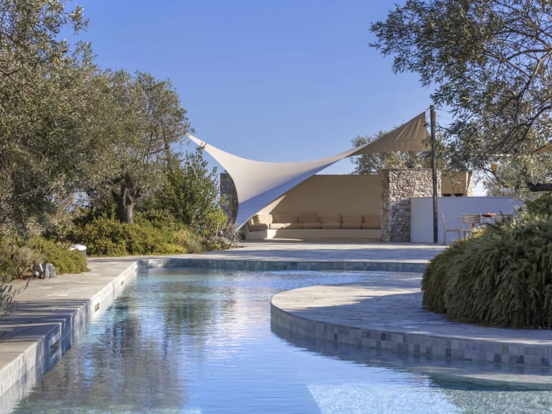 Relaxing down by Adelphia's extraordinary, 25m-long pool.