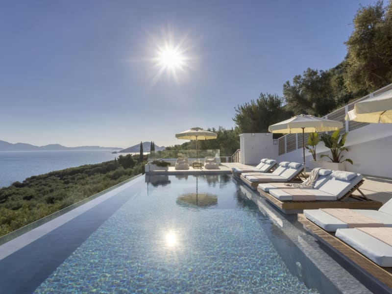 Amiddalia's beautiful infinity pool with its magical views over Keri Bay.