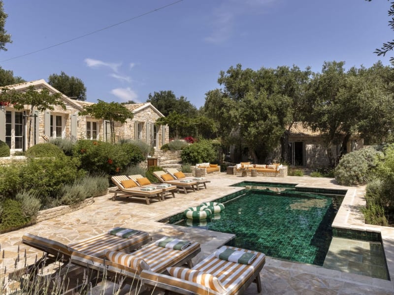 The shady gardens, terraces and pool.