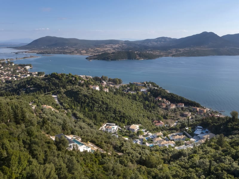 Casa Rosemary (bottom left) perches in a panoramic position amidst the greenery of Lefkada's east coast.