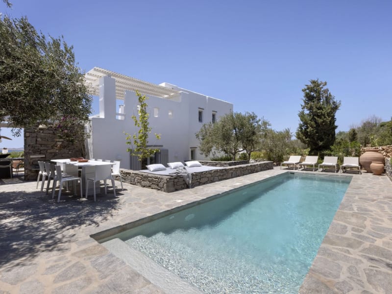 The pool terrace hosts one of the property's lounge areas as well as an al fresco dining area.