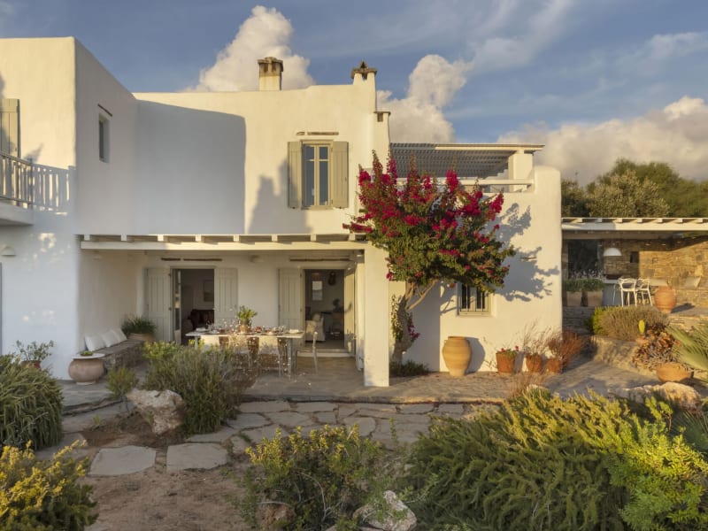 Ephyra's handsome façade framed by its mature, beautifully tended gardens.