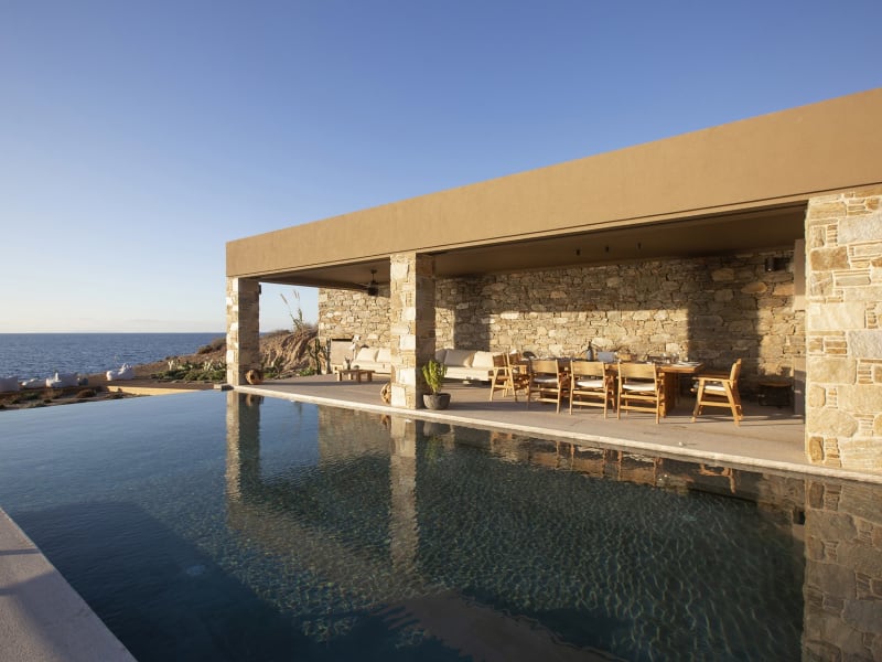 The gorgeous pool has a shallow section with hydromassage jets.