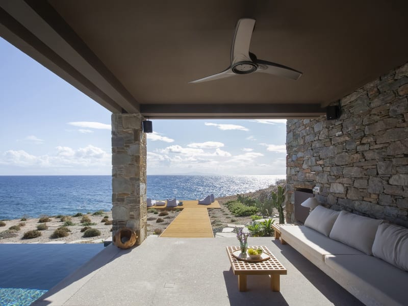 The convivial al fresco dining and sitting area by the pool.