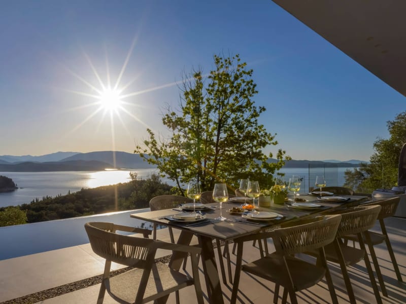 The outdoor dining area boasts incredible views over to the sea.