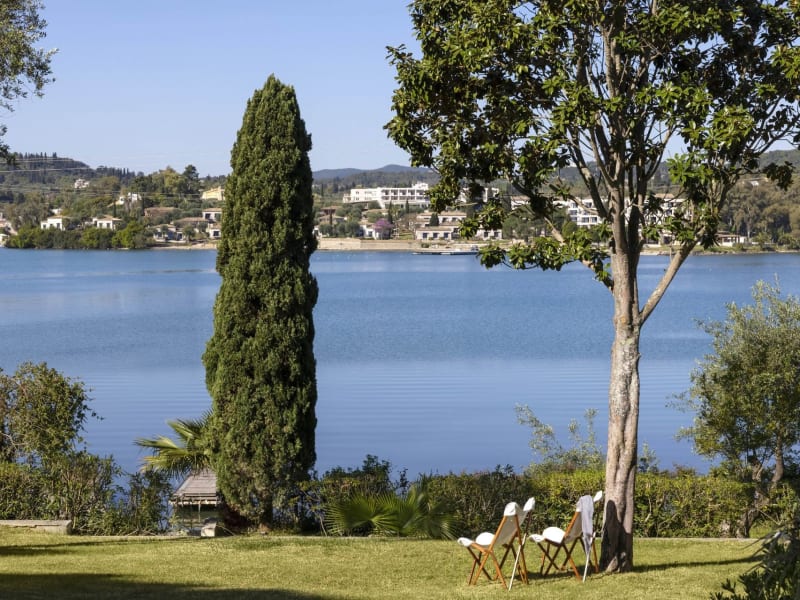 Ophira's mature, beautifully tended gardens seem to merge with the sea.
